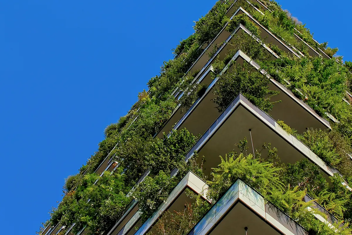 SECR reporting threshold — a green living facade on a UK office building