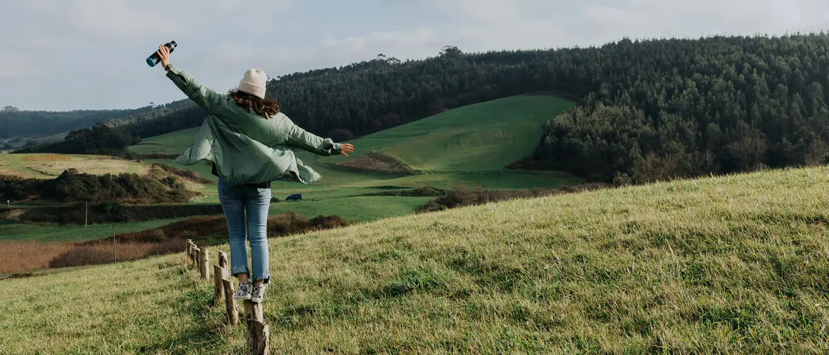 SECR requirements next steps — walker on a green UK hillside